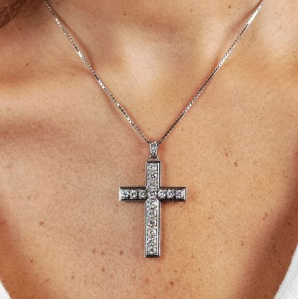 Pendentif croix en platine 850 millièmes sertie de