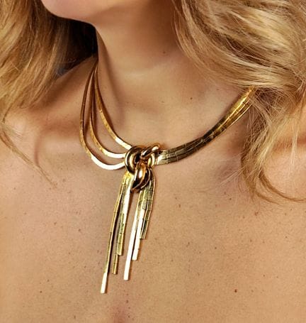Important collier draperie en or jaune 750 millièm