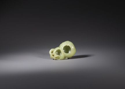 Une cruche en jade jaune en forme de double caleba