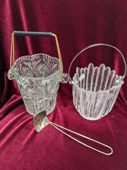 Set of two glass and metal ice buckets. One featur