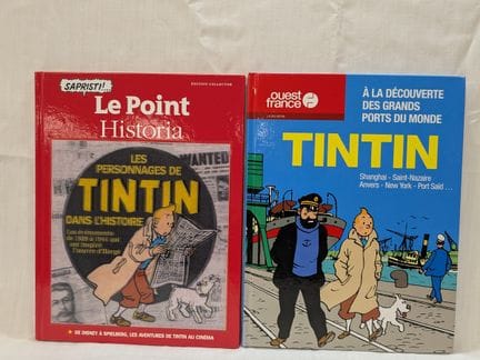 Lote de dos álbumes que incluye Le Point, Historia