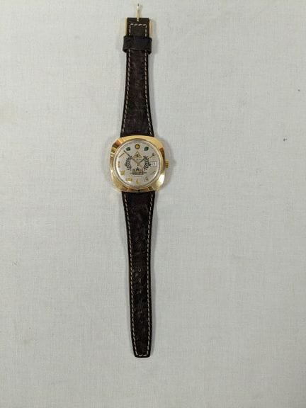 Massoneria, orologio da polso con cassa in metallo