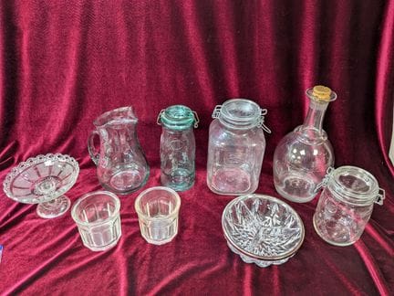 Glass set, including a vase, a pitcher, bowls, jar