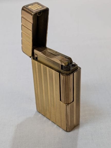 DUPONT. Gold-plated lighter with guilloché decorat