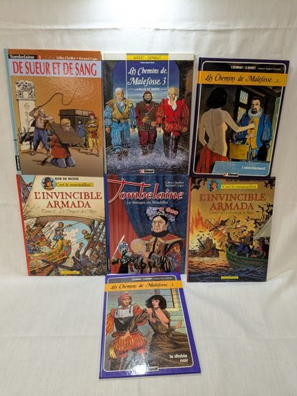 Set di 7 fumetti, tra cui *Les Chemins de Malefoss
