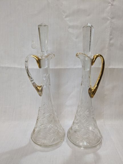 Pair of cut crystal ewers, partially gilded. Heigh