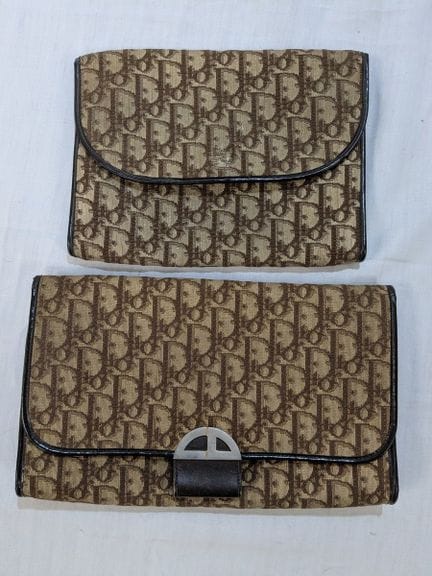 DIOR Set of two monogrammed canvas clutches. Lengt