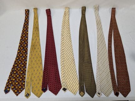 Large selection of ties, including LANVIN and YSL.