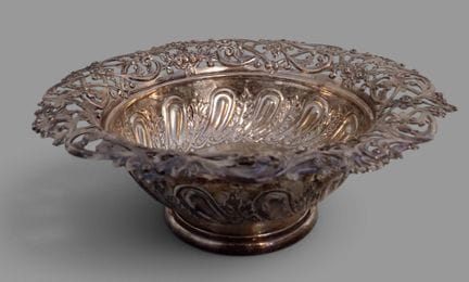Round silver bowl, stamped and partially openwork,