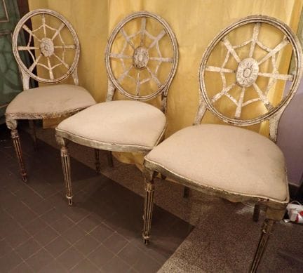 A set of three iron chairs with a silver patina, m