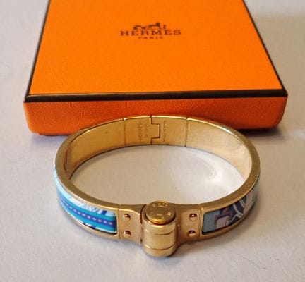 Hermès - Parigi: bracciale in metallo dorato smalt