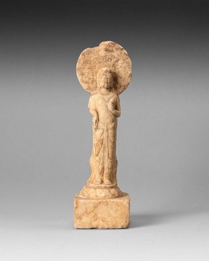 Marble bodhisattva statue, standing on a lotus-sha