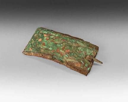 Bronze belt buckle inlaid with turquoise; the cont
