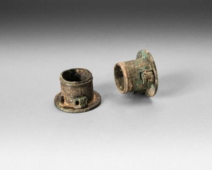 Pair of bronze chariot axle covers decorated with 