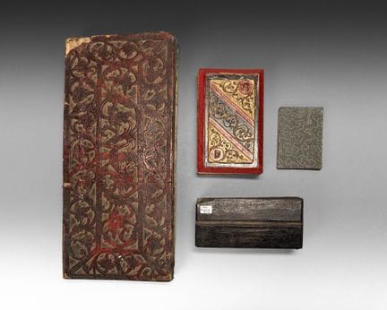 Set of four books:
- A book bound in accordion-fol