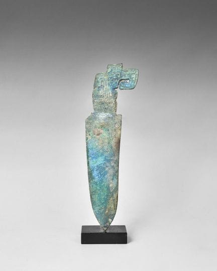 Ceremonial bronze dagger with green and blue patin