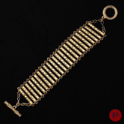 CHANEL - ANNI '90 - BRACCIALE
METALLO DORATO
MOTIV