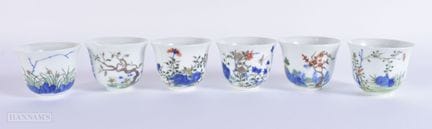 UN JUEGO DE SEIS TAZAS DE TÉ DE PORCELANA CHINA DE