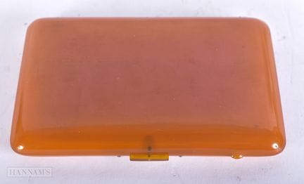 AN ART DECO BUTTERSCOTCH BAKELITE CIGARETTE CASE. 