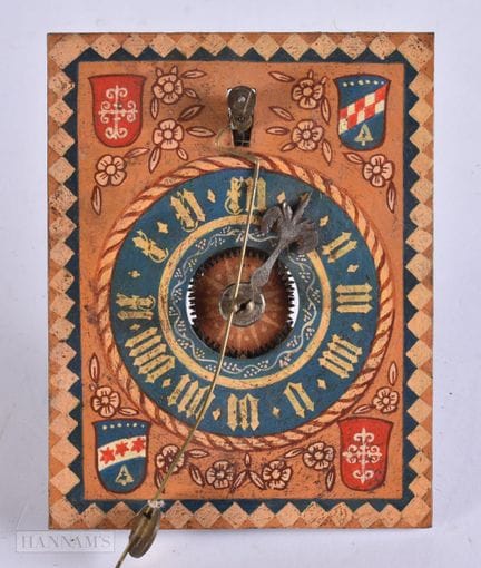 Un pequeño mecanismo de reloj del siglo XIX con es