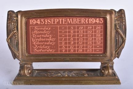 An Art Deco Bronze Calendar with Cricket / Insect 