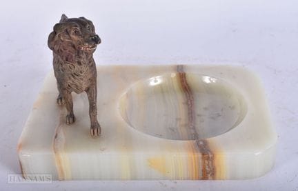 AN ART DECO COLD PAINTED BRONZE AND ONYX INKWELL. 