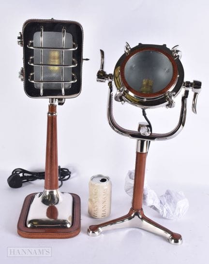 TWO LEATHER AND CHROME LAMPS. Largest 52 cm high. 