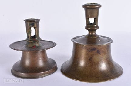 TWO 17TH CENTURY CONTINENTAL BRONZE CANDLESTICKS. 