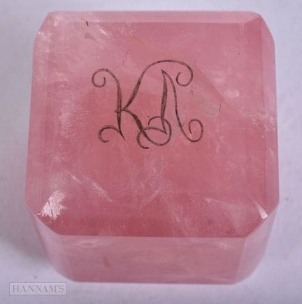 AN ART DECO ROSE QUARTZ DESK WEIGHT. 4.25 cm squar