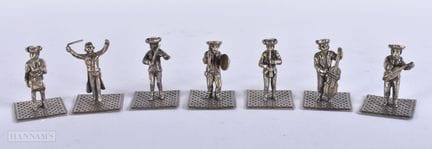 A SET OF SEVEN CONTINENTAL SILVER MINIATURE FIGURE