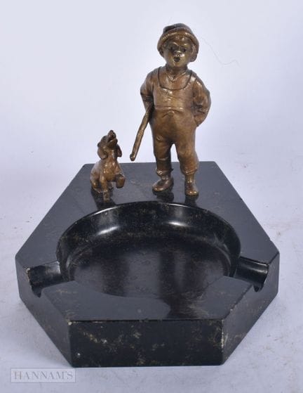 AN ART DECO BRONZE AND MARBLE ASHTRAY formed with 