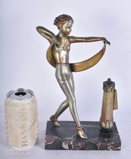 AN ART DECO COLD PAINTED SPELTER TABLE LIGHTER for