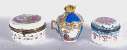 TWO CONTINENTAL PORCELAIN BOXES and a German cup &
