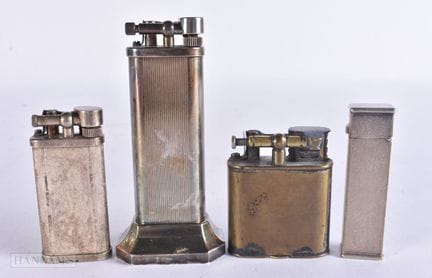 CUATRO ENCENDEDORES DUNHILL. El más grande mide 10