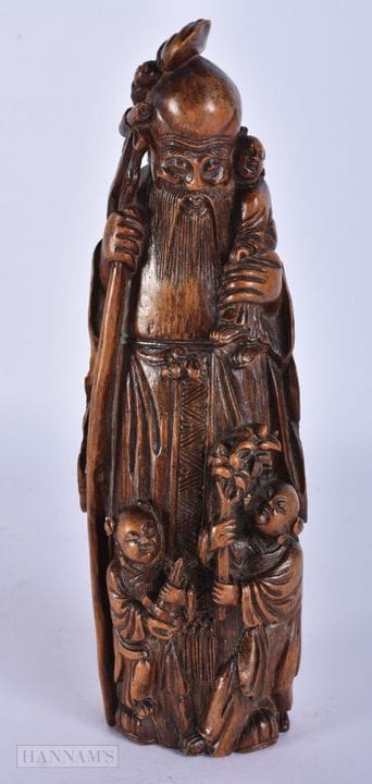 Eine chinesische, geschnitzte Bambusfigur eines Un
