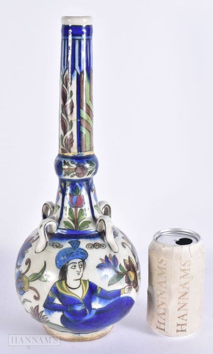 A 19TH CENTURY MIDDLE EASTERN ISLAMIC QAJAR POTTER