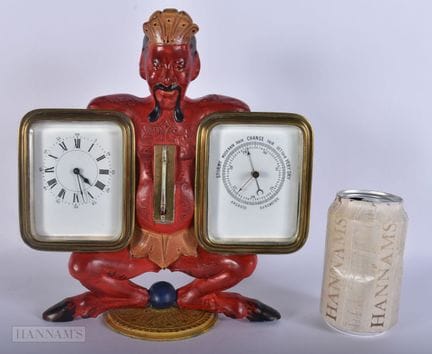AN UNUSUAL ART DECO COLD PAINTED MANTEL CLOCK & BA
