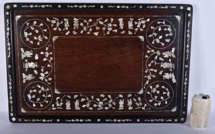 A 19TH CENTURY CHINESE CARVED HUANGHUALI MOTHER OF