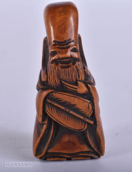 NETSUKE DE MADERA TALLADA DEL PERÍODO EO JAPONÉS D