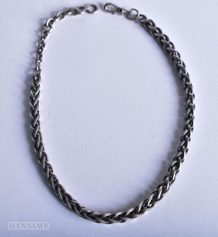 A WHITE METAL ALBERT CHAIN. 32 grams. 33 cm long.