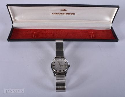 UN RELOJ DE MUÑECA VINTAGE DE JAQUET-DROZ. En func