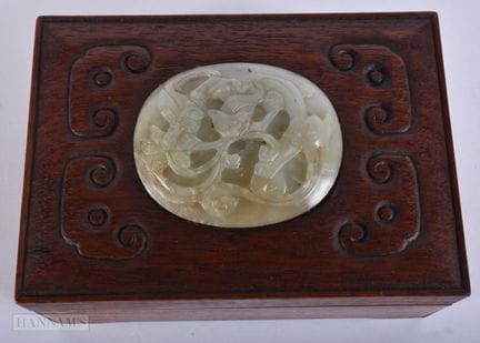 AN 18TH/19TH CENTURY CHINESE CARVED HUANGHUALI JAD