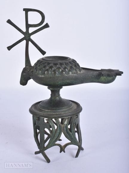 EINE AUSSERGEWÖHNLICHE BRONZE-ÖLLAMPE AUS DEM 19. 