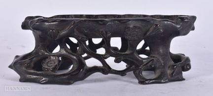A 19TH CENTURY CHINESE CARVED HARDWOOD STAND Late 
