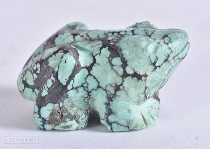 A CHINESE QING DYNASTY CARVED TURQUOISE FIGURE OF 