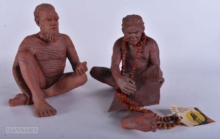 A PAIR OF NEW ZEALAND PAINTED TERRACOTTA ABORIGINA