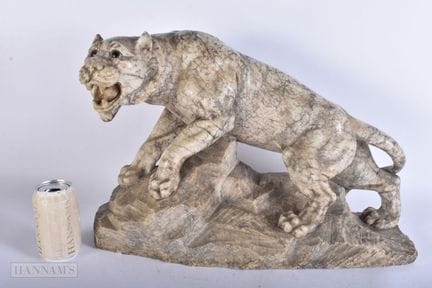 A LARGE EARLY 20TH CENTURY EASTERN CARVED STONE FI