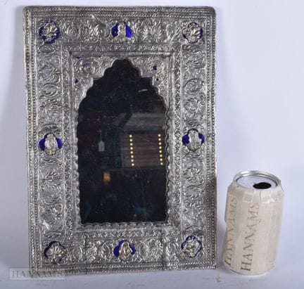 Espejo islámico de plata y esmalte del Oriente Med