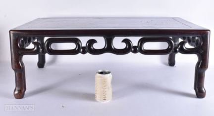 A 19TH CENTURY CHINESE CARVED HUANGHUALI WOOD LOW 
