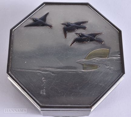 A 19TH CENTURY JAPANESE MEIJI PERIOD OCTAGONAL SIL